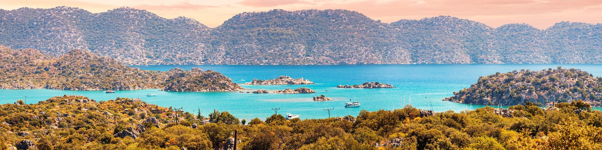 Kekova Island with its famous flooded city is one of the most popular resorts and tourist attractions in Turkey. Panoramic idyllic view