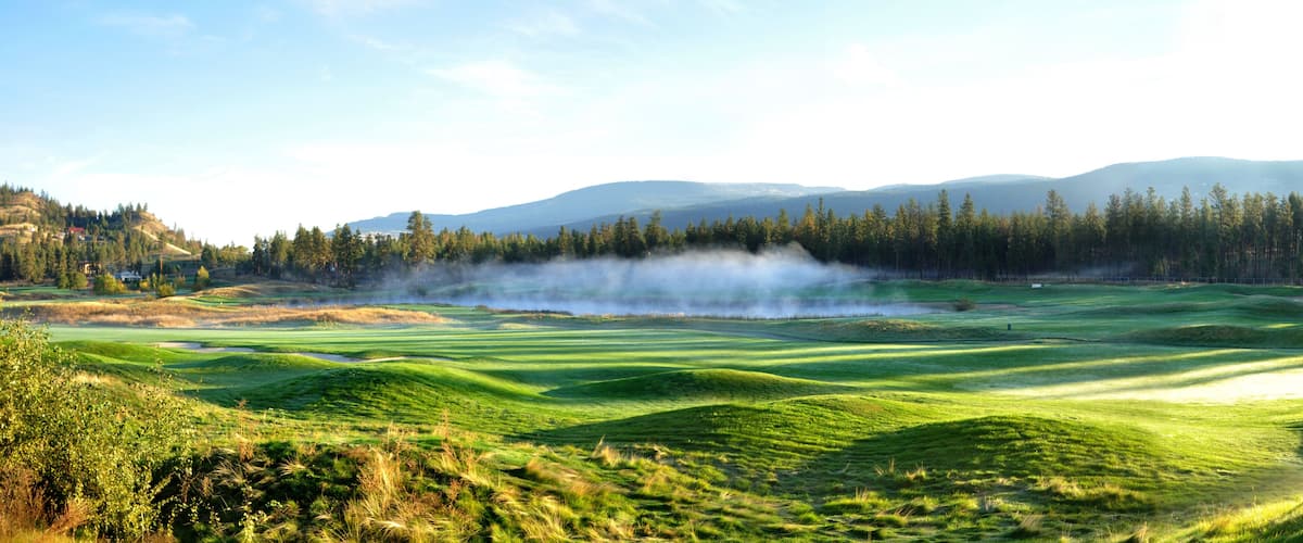 Morning mist over a pod at a golf course in the Okanagan Valley of British Columbia Canada