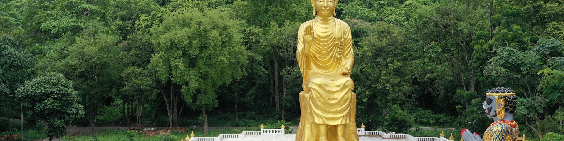 Temple in Ratchaburi Thailand rests at the bottom of the mountain