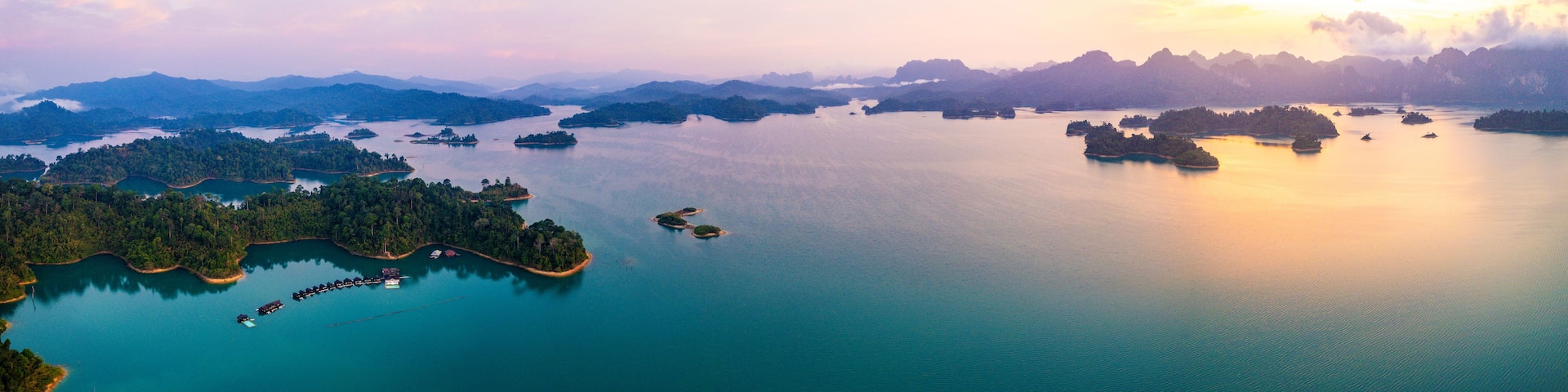 A coastal landscape with numerous islands and a clear sky.