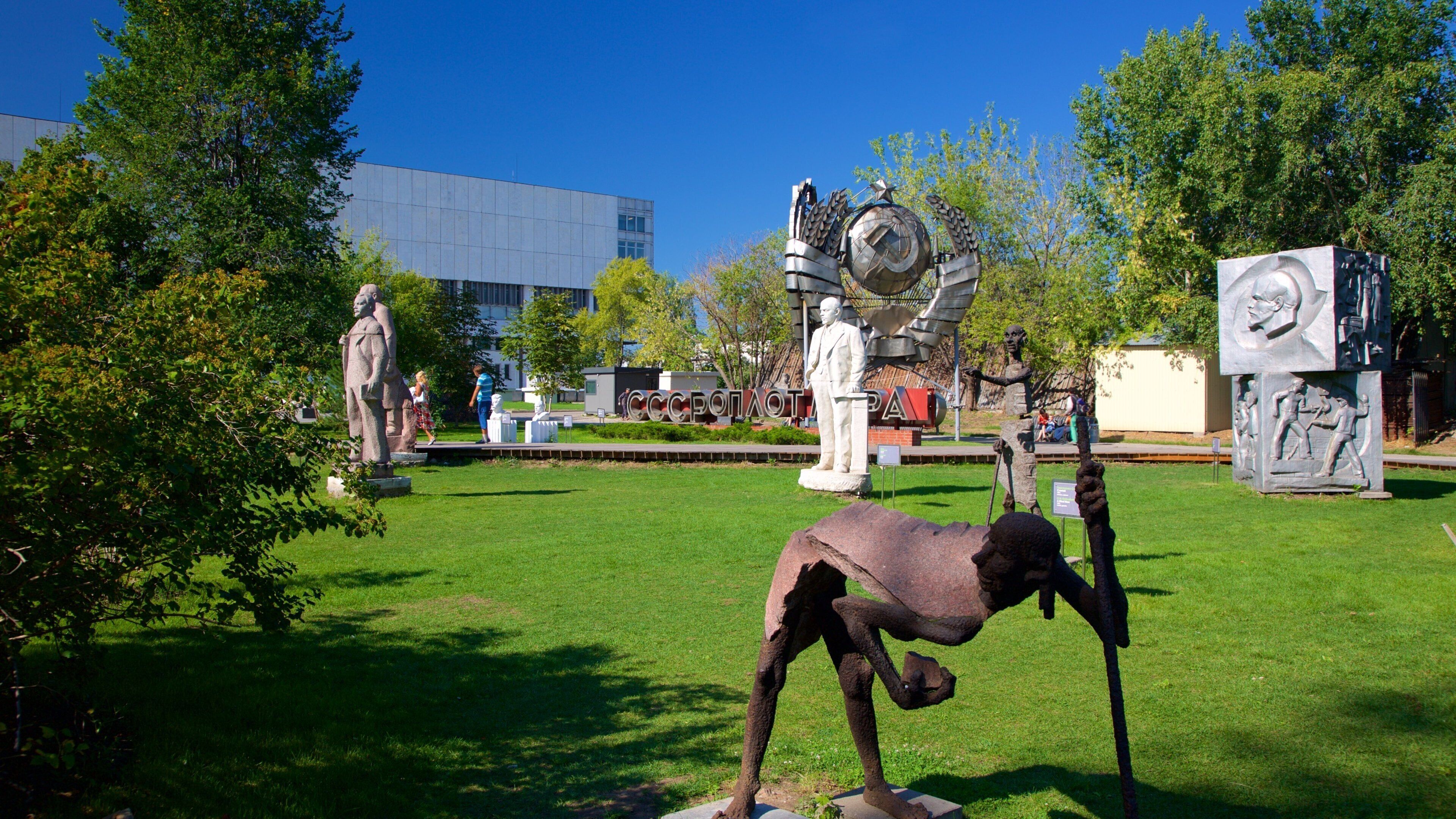 Fallen Monument Park showing a statue or sculpture, outdoor art and a garden