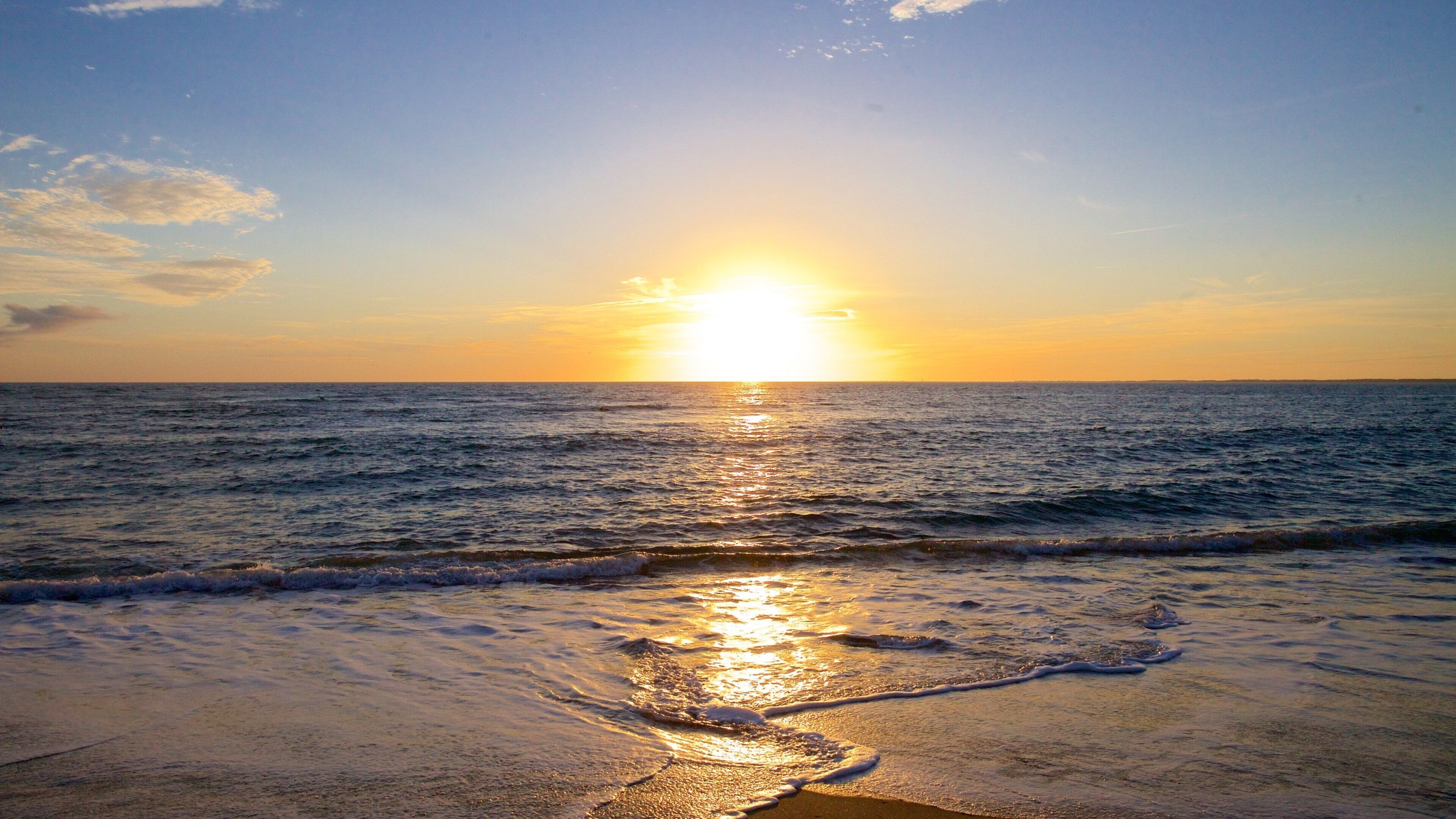 Cape Hatteras National Seashore showing a beach and a sunset