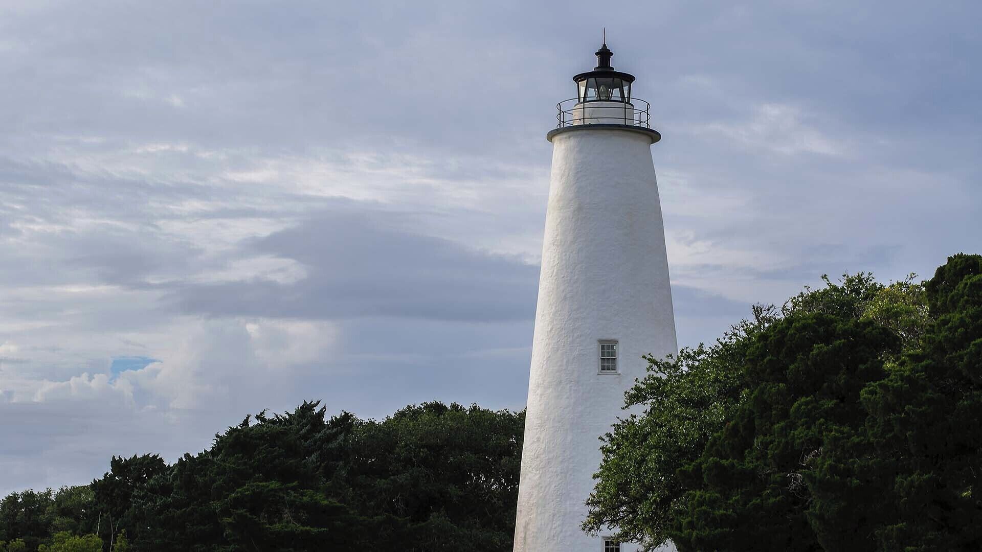 The remote Ocracoke Lighthouse is on an island and is only reachable by ferry.  Definitely worth the trip though as the beaches on the island are beautiful.  View a full video guide of the lighthouse here:  https://www.hdcarolina.com/episode/ocracoke-lighthouse
#Lighthouse