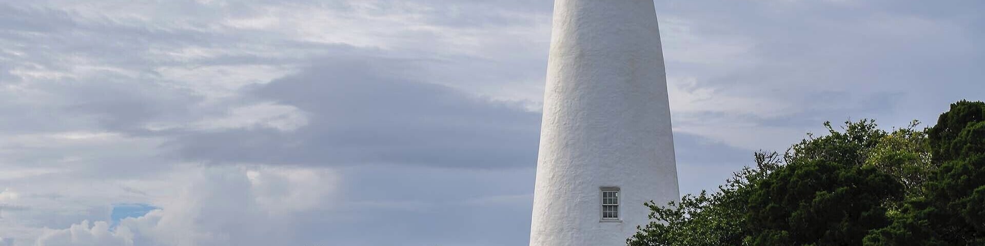 The remote Ocracoke Lighthouse is on an island and is only reachable by ferry.  Definitely worth the trip though as the beaches on the island are beautiful.  View a full video guide of the lighthouse here:  https://www.hdcarolina.com/episode/ocracoke-lighthouse
#Lighthouse