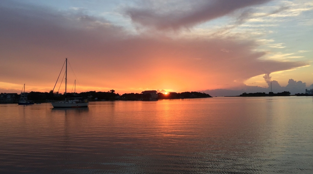 If you like a quite vacation spot, then Ocracoke Island is a cool place. It is only accessible via ferry; but once there, there are some good restaurants and some great places to watch the sunset on the harbor.
