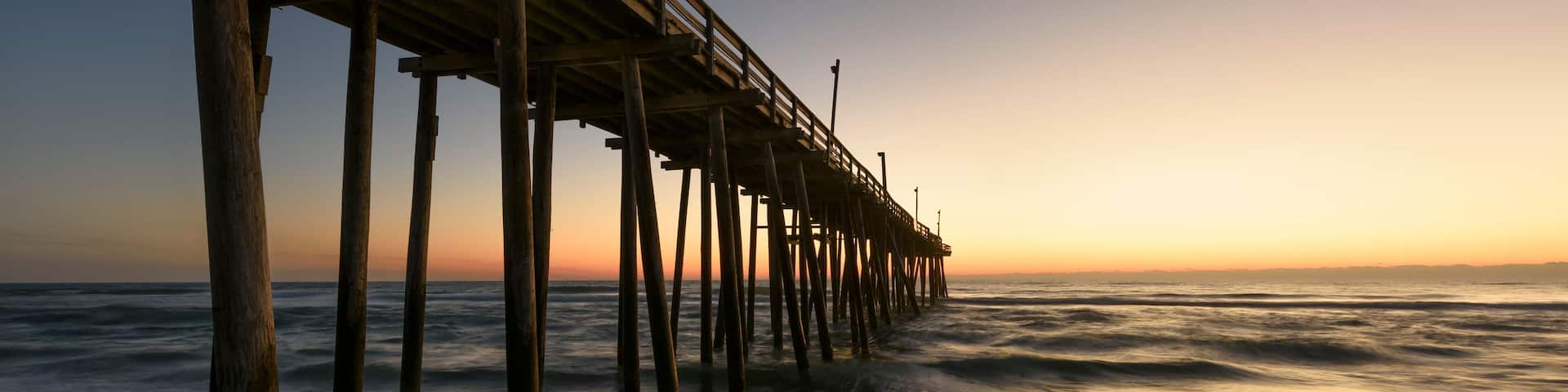 Ocean Pier in Golden Light of Sunrise