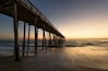 Ocean Pier in Golden Light of Sunrise