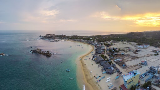 stunning 6k aerial panoramic view of huatulco oaxaca mexico beach summer spring national park at sunset