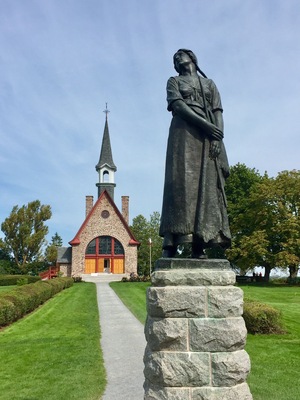 Statue to the fictional character Evangeline in front of the memorial building for the displaced Acadiens. For 8 years in the middle 1700's the British forcibly removed the French speaking Acadiens from this area because of an unfounded fear that they would take up arms against them. Grand Pre was an area of reclaimed land that was incredibly fertile. Once the Acadiens were removed from the area it was settled by British citizens including some from the original 13 colonies when the American Revolutionary War started.