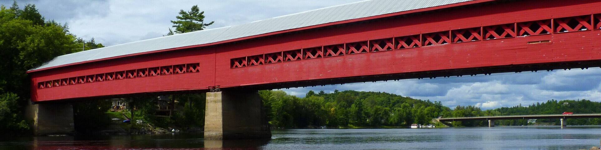 Originally built in 1915, the community raised funds to rebuild the bridge after a fire in 1984. The bridge is used for pedestrian traffic, but also hosts festivals and movie nights. And the rocks on the river shores below the bridge are a perfect place to laze on a sunny afternoon. #architecture