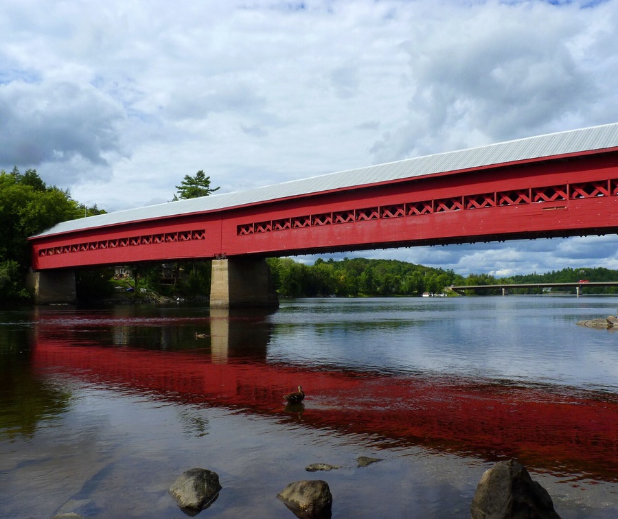 Originally built in 1915, the community raised funds to rebuild the bridge after a fire in 1984. The bridge is used for pedestrian traffic, but also hosts festivals and movie nights. And the rocks on the river shores below the bridge are a perfect place to laze on a sunny afternoon. #architecture
