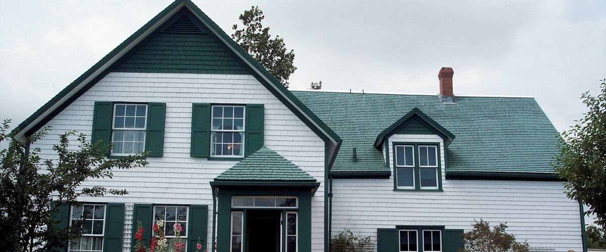 There she is - Ann waving from the window of Green Gables. #stories #Maritimes #PEI