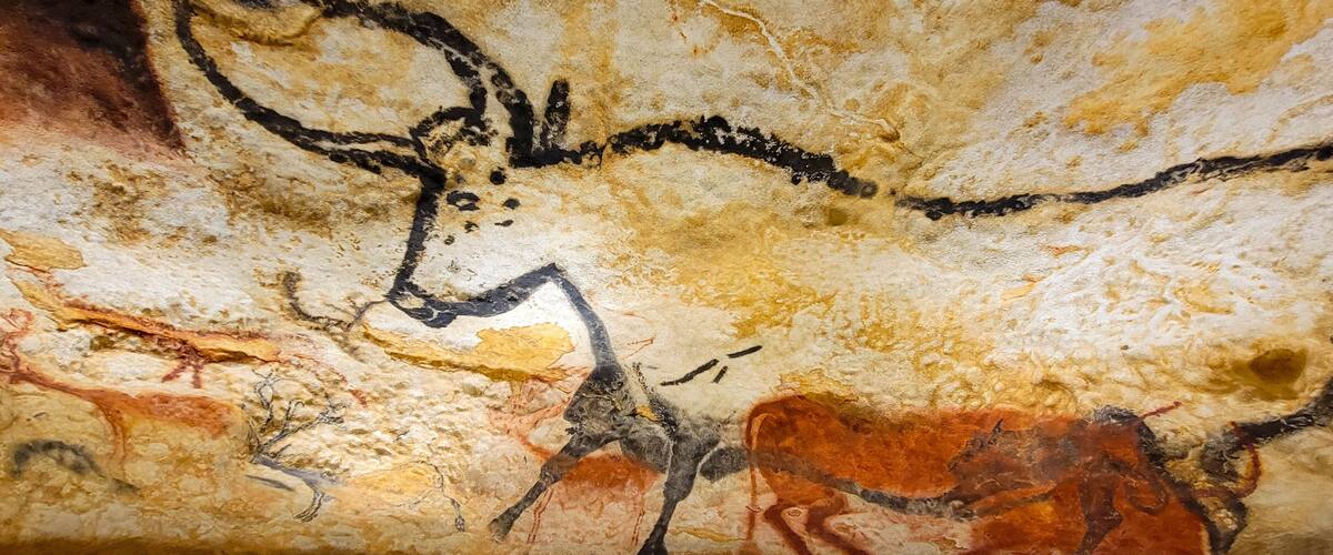 Cave paintings of animals and human figures.