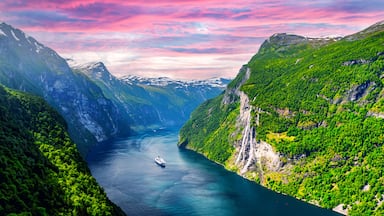Panorama of breathtaking view of Sunnylvsfjorden fjord and famous Seven Sisters waterfalls, near Geiranger village in western Norway. Landscape photography