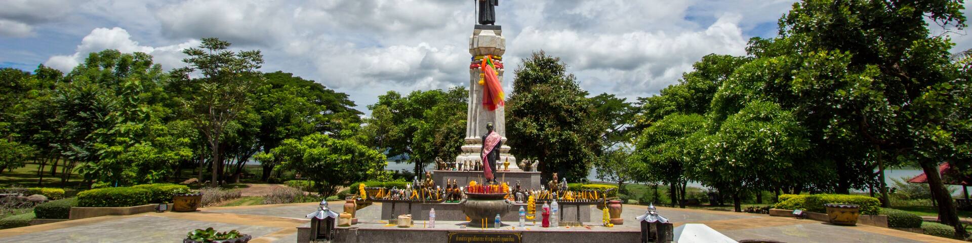 Thao Suranari statue with beautiful sky at Thao Suranari Park,Ban Nong Sarai,Pak Chong,Nakhon Ratchasima,Thailand.Non English texts mean the worship words.
