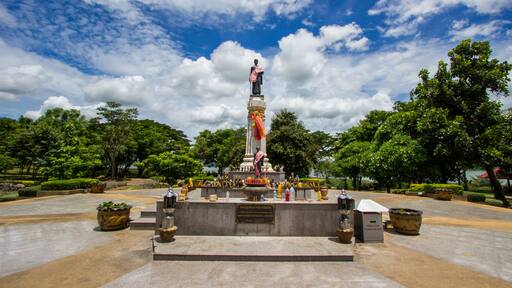 Thao Suranari statue with beautiful sky at Thao Suranari Park,Ban Nong Sarai,Pak Chong,Nakhon Ratchasima,Thailand.Non English texts mean the worship words.