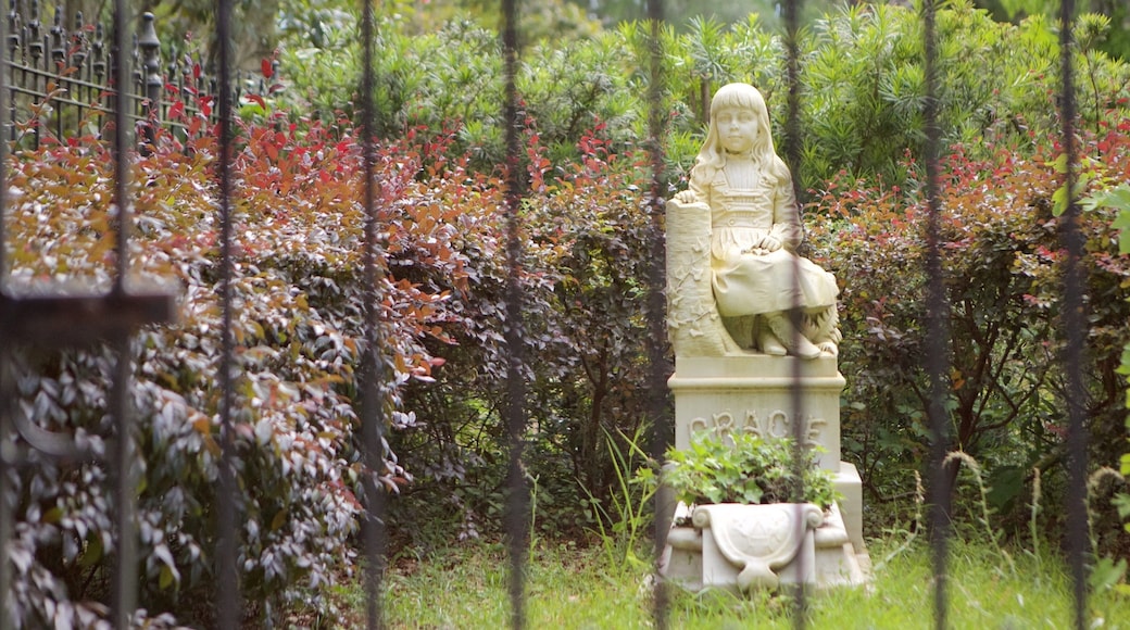 Bonaventure Cemetery showing a statue or sculpture and a park