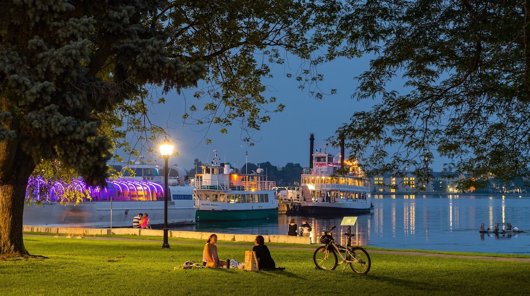 Kingston City Hall showing a bay or harbor, night scenes and picnicing