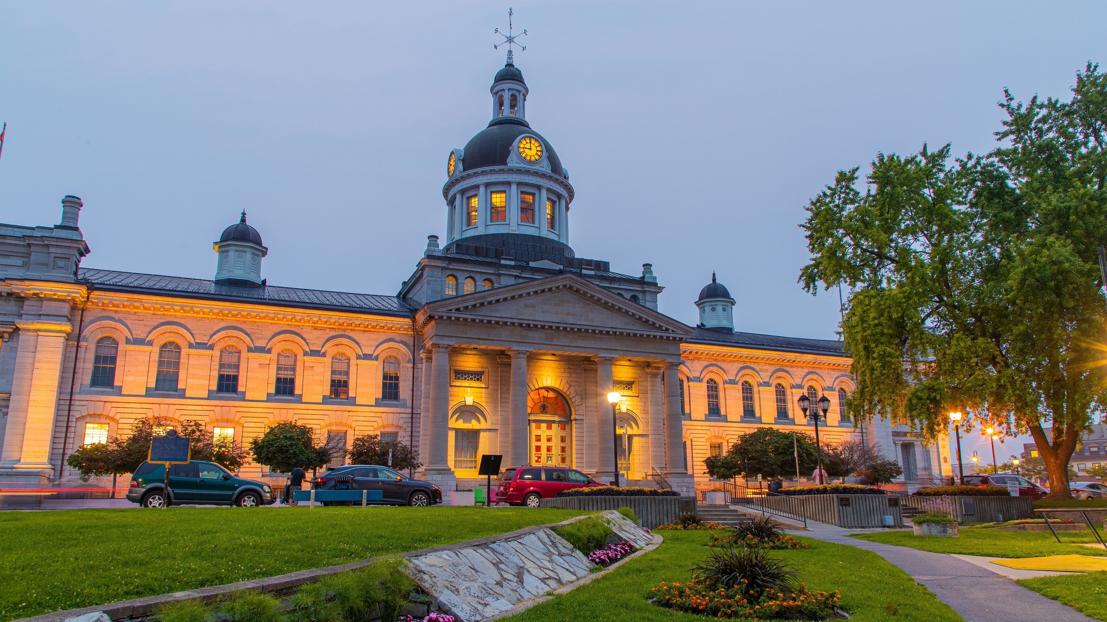 Kingston City Hall featuring night scenes, an administrative buidling and heritage architecture