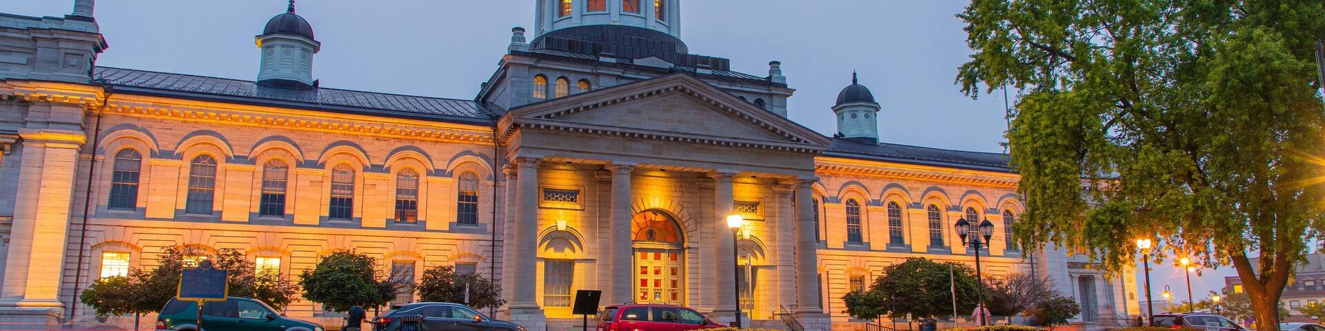 Kingston City Hall featuring night scenes, an administrative buidling and heritage architecture