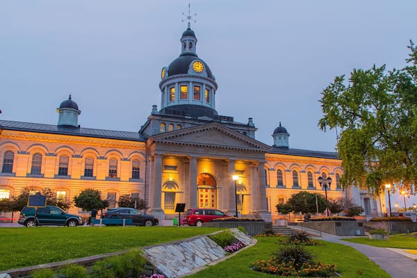 Kingston City Hall featuring night scenes, an administrative buidling and heritage architecture