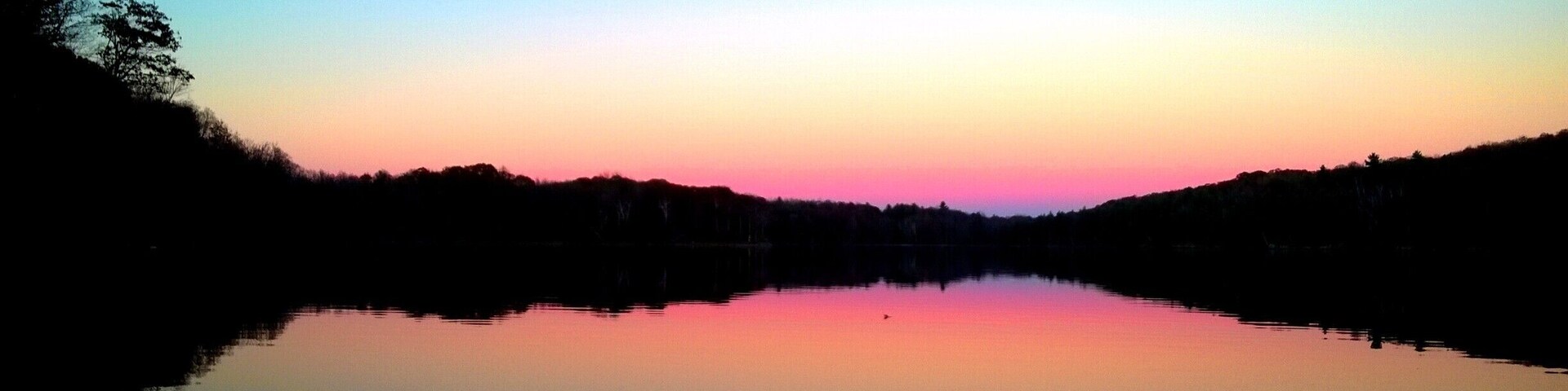 Sunset reflections on the water. Which way is up? #camping #sunset