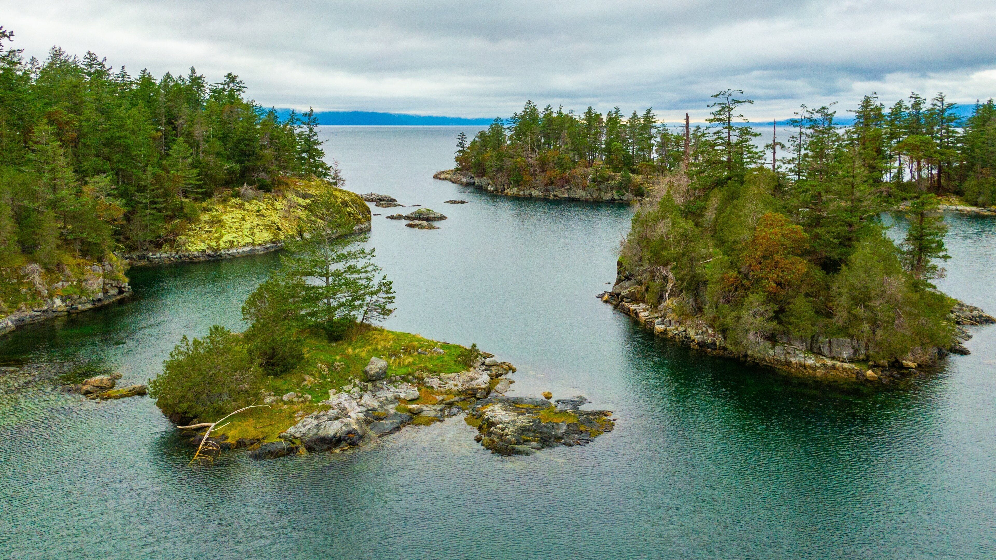 Smuggler Cove Marine Provincial Park showing island views, landscape views and a lake or waterhole