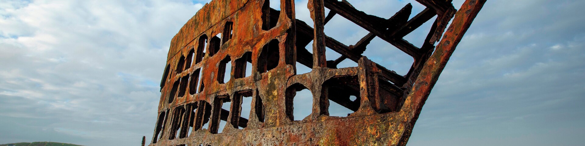When visiting the wreck of the Peter Iredale take time to notice the kaleidoscopic colors of rust and moss.