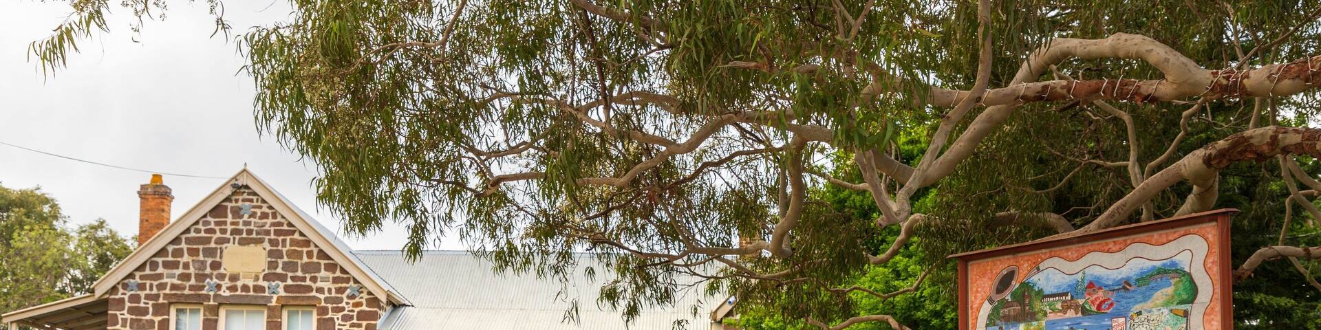 Merimbula Imlay Historical Society showing a small town or village and signage
