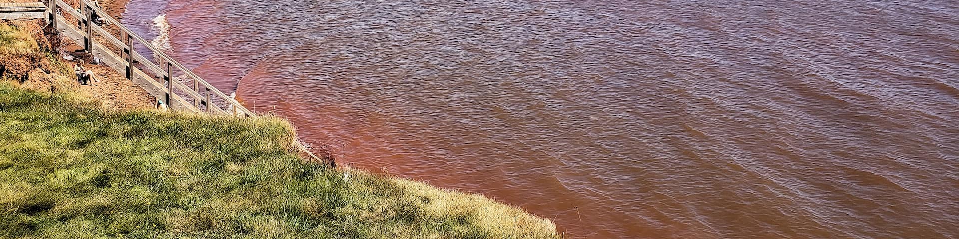 Argyle Shore Provincial Park can be found on the south side of the island and thus home to the beautiful red beaches PEI is known for. This park while small is very beautiful and the perfect spot for a picnic, swim, or just relaxing. There are stairs that lead you down to the water during low tide but be sure to get out before water levels rise. The park offers free parking, washrooms, a playground and is pet friendly.