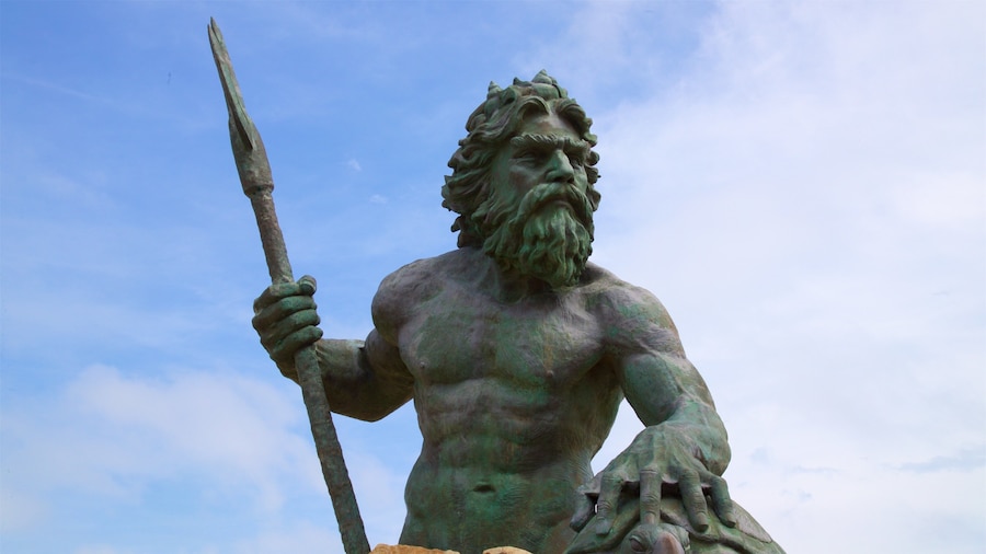 Neptune\'s Park which includes a statue or sculpture