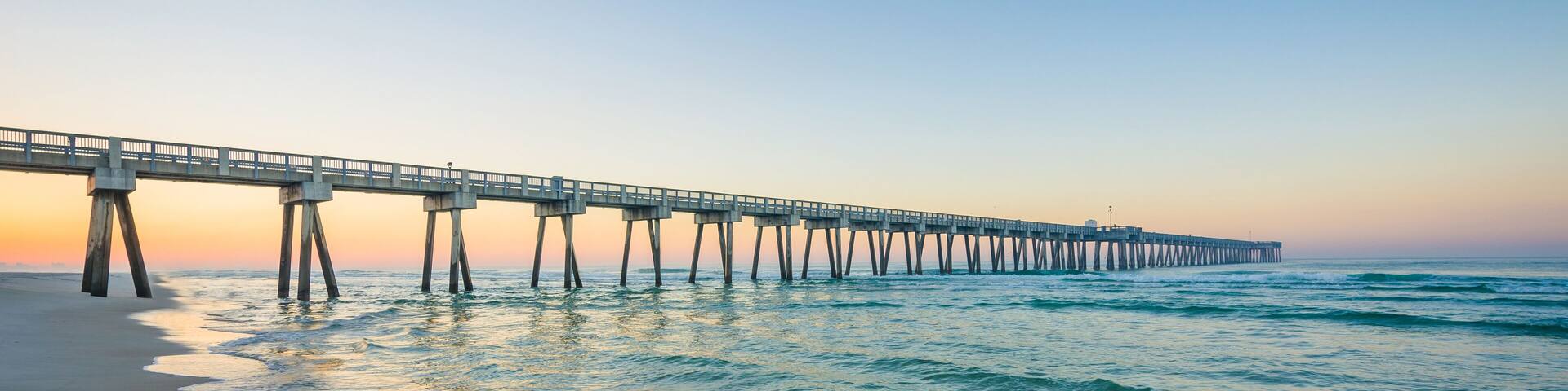 The M.B. Miller County Pier and Gulf of Mexico at sunrise, in Panama City Beach, Florida., Shutterstock ID 560982808, Purchase Order: SP-1891 Wave 0, Client/Licensee: Hotels.com