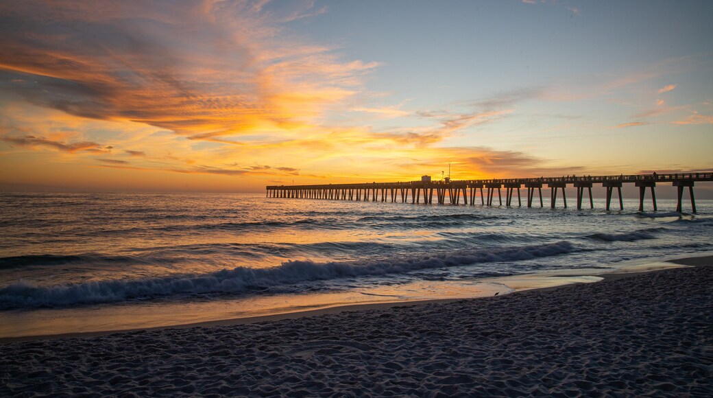 Florida Panhandle featuring a sandy beach, a sunset and general coastal views