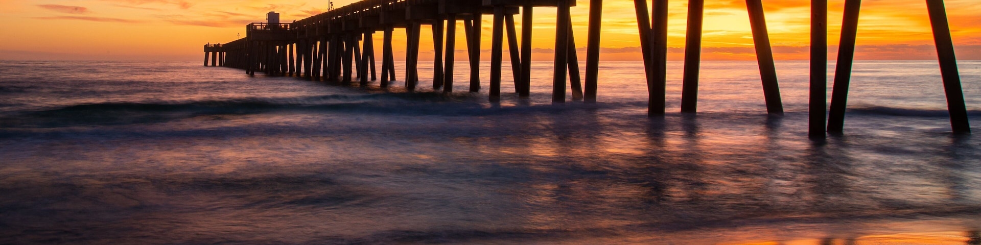 Florida featuring general coastal views and a sunset
