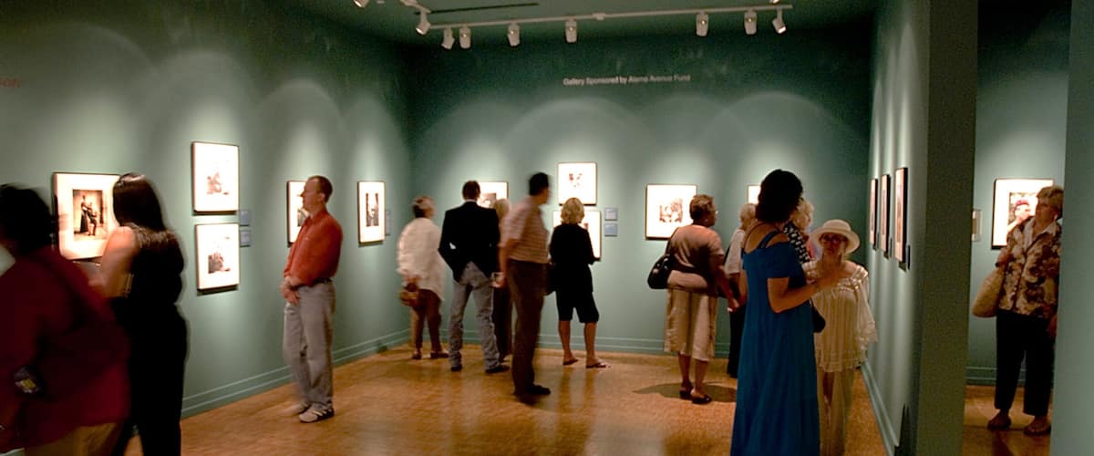 Colorado Springs Fine Arts Center featuring interior views and art as well as a large group of people
