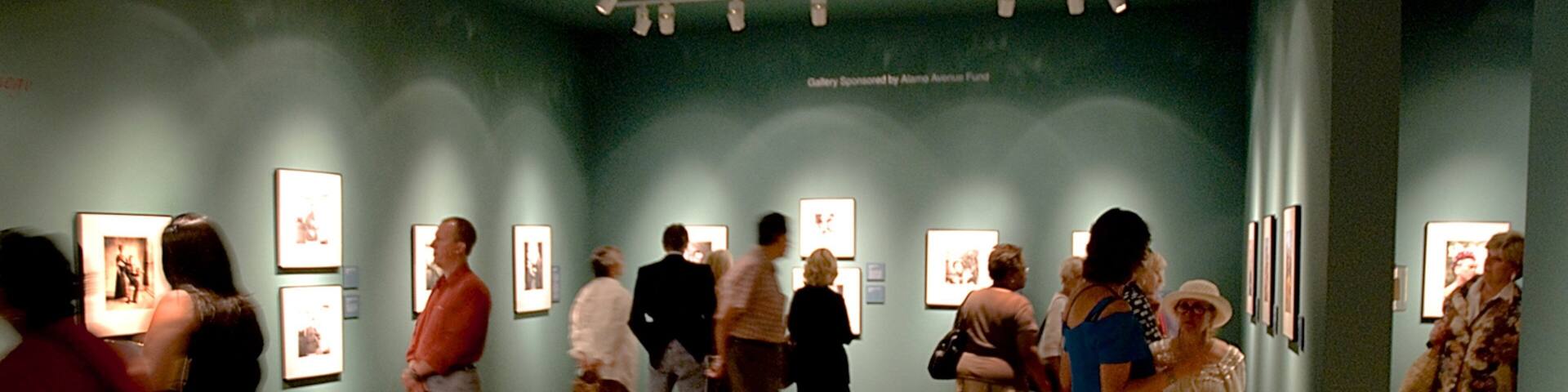 Colorado Springs Fine Arts Center featuring interior views and art as well as a large group of people