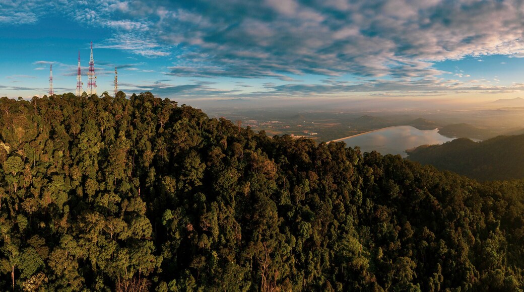 Aerial view of Bukit Mertajam Hills and Mengkuang Dam during sunrise. Located at Bukit Mertajam, Penang.