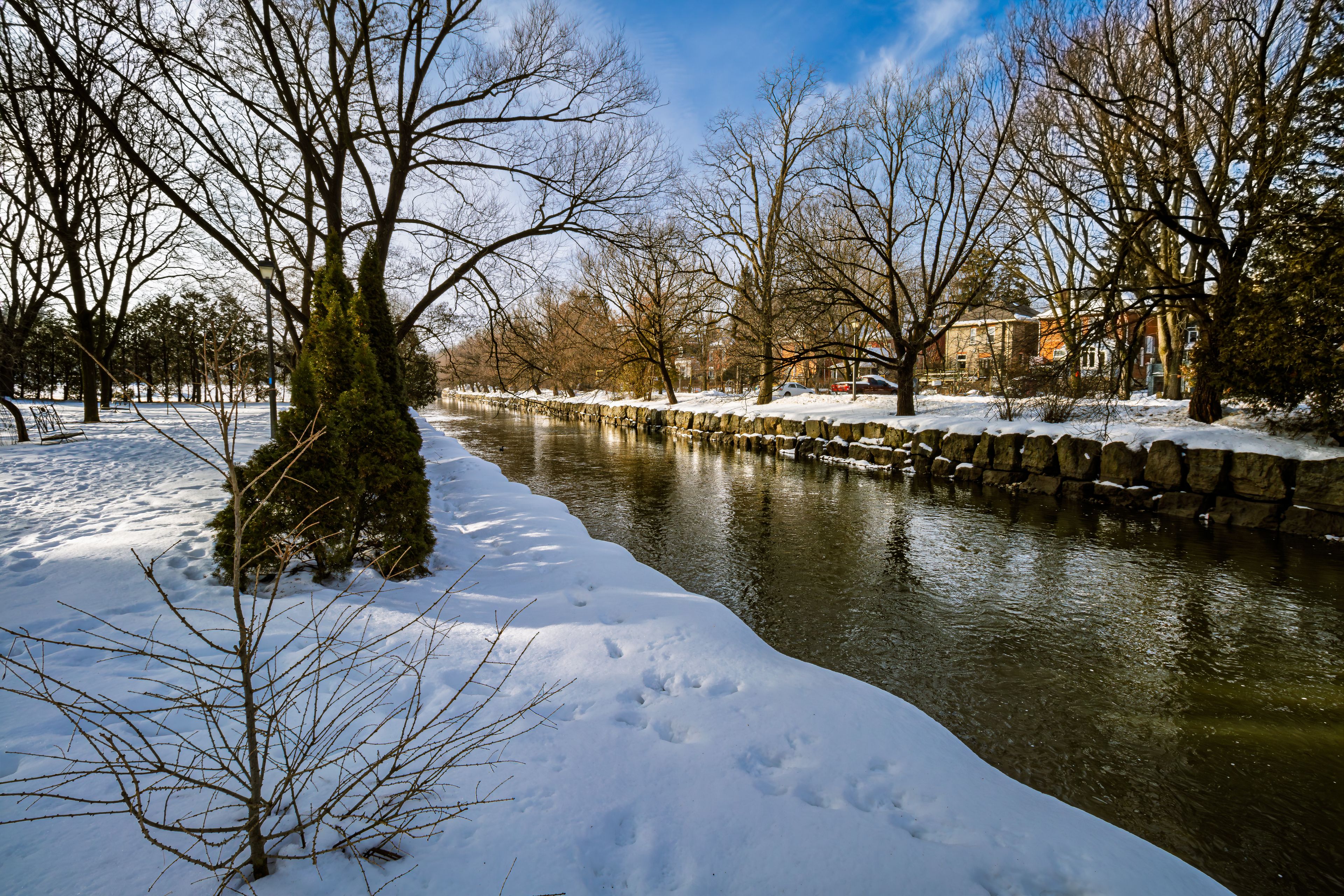 Shakespearean Gardens park at Stratford, near the Avon River, covered in snow  in the winter.