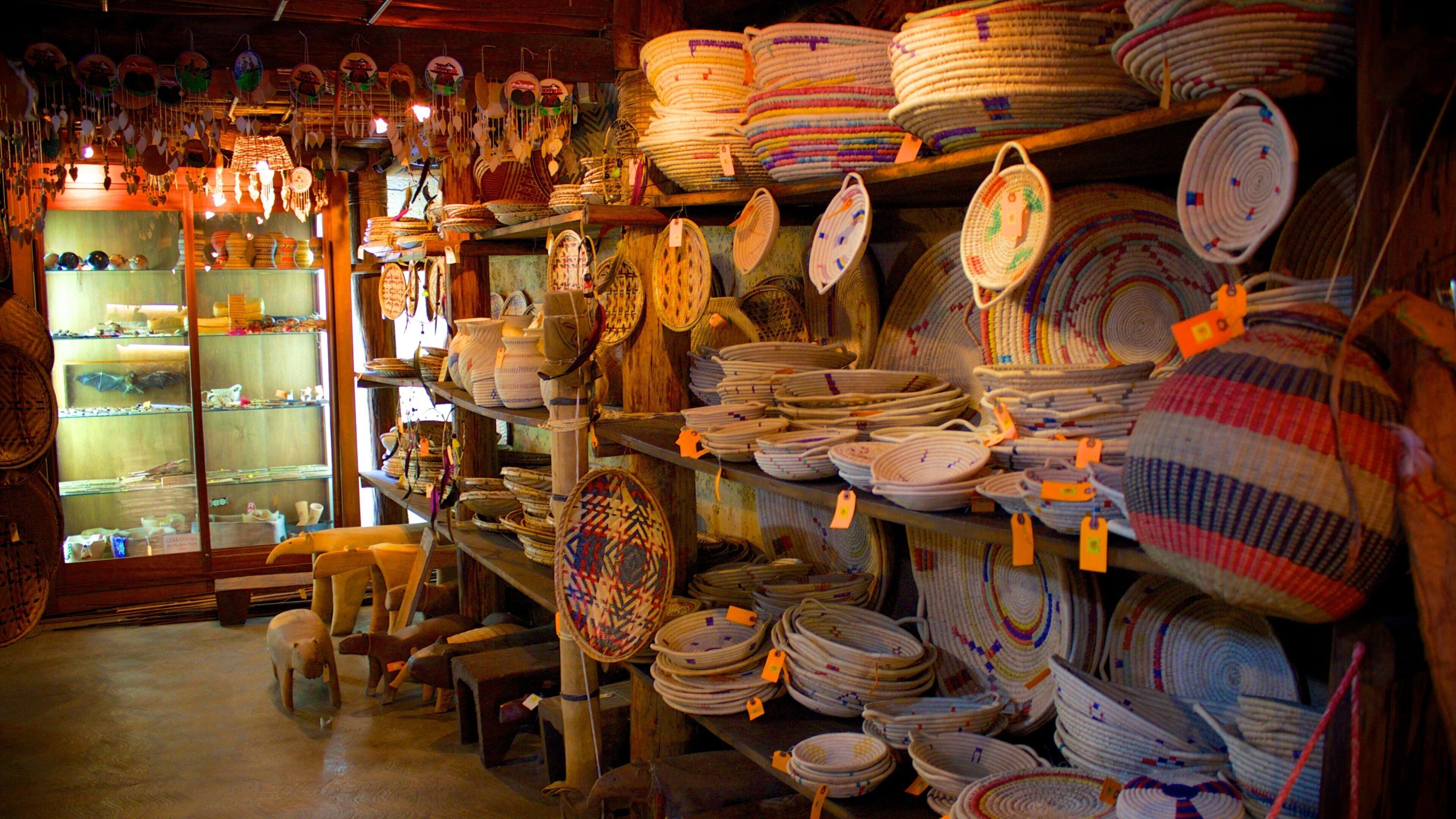 A store with shelves full of woven baskets and pottery.