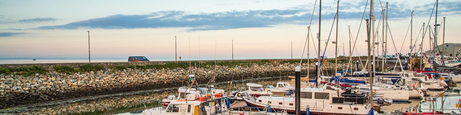 Kilmore showing a bay or harbor and a sunset
