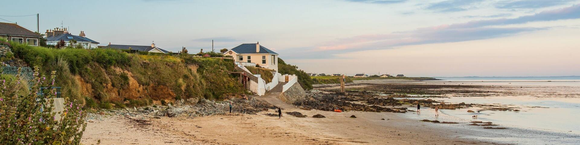 Kilmore featuring general coastal views, a beach and a sunset