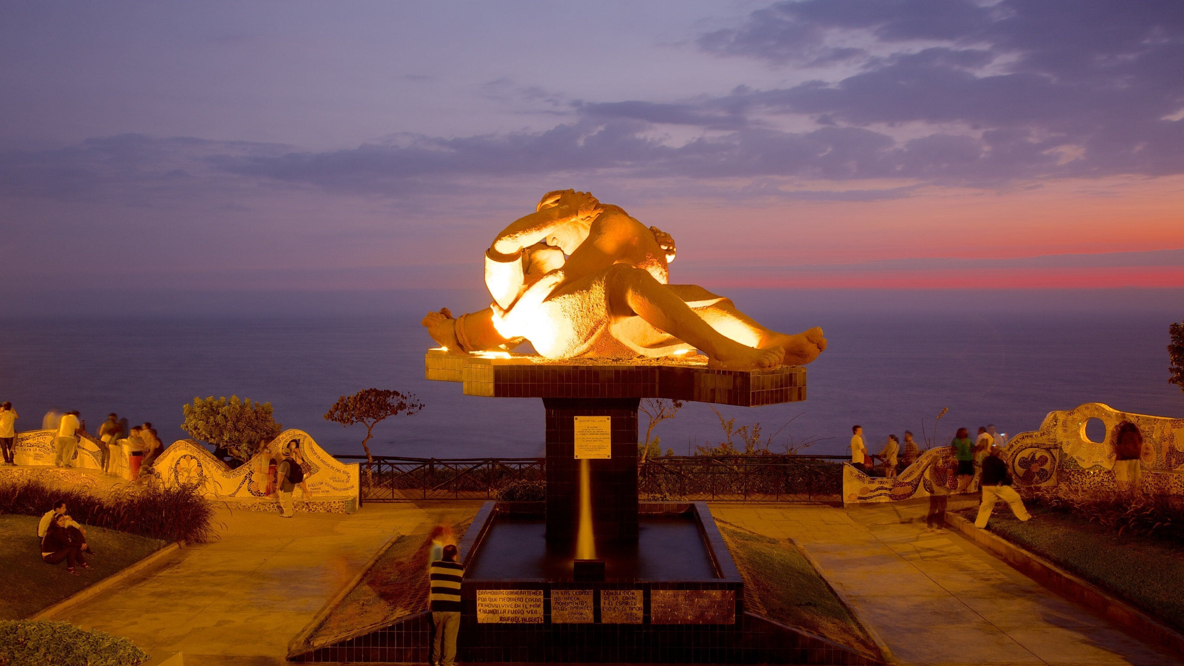 Parque del Amor which includes night scenes, a sunset and outdoor art
