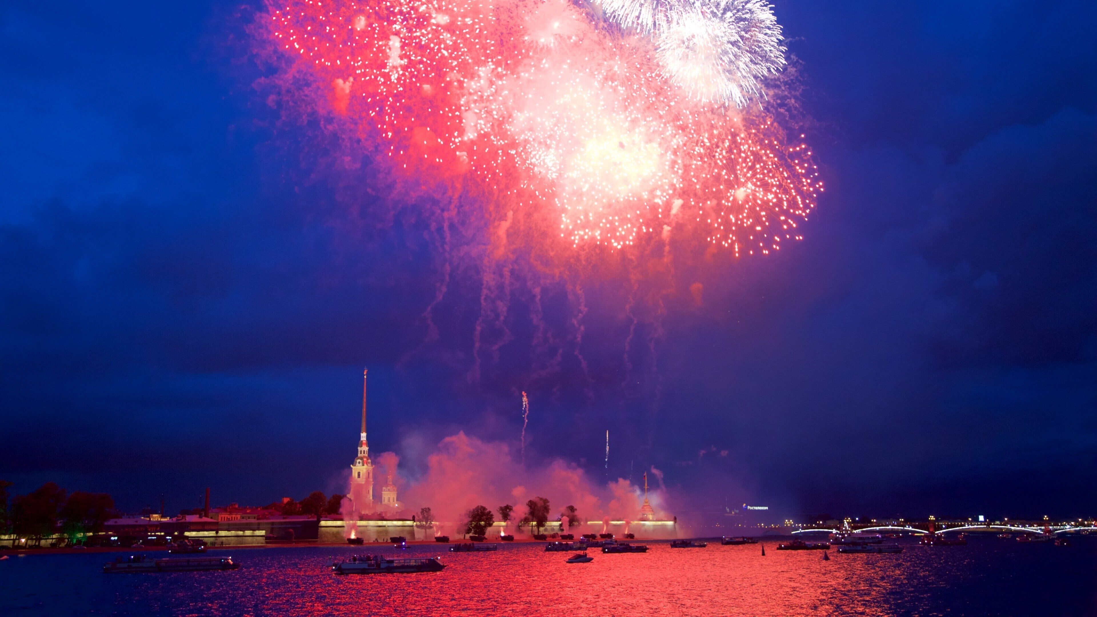 Strelka showing a river or creek, night scenes and a city