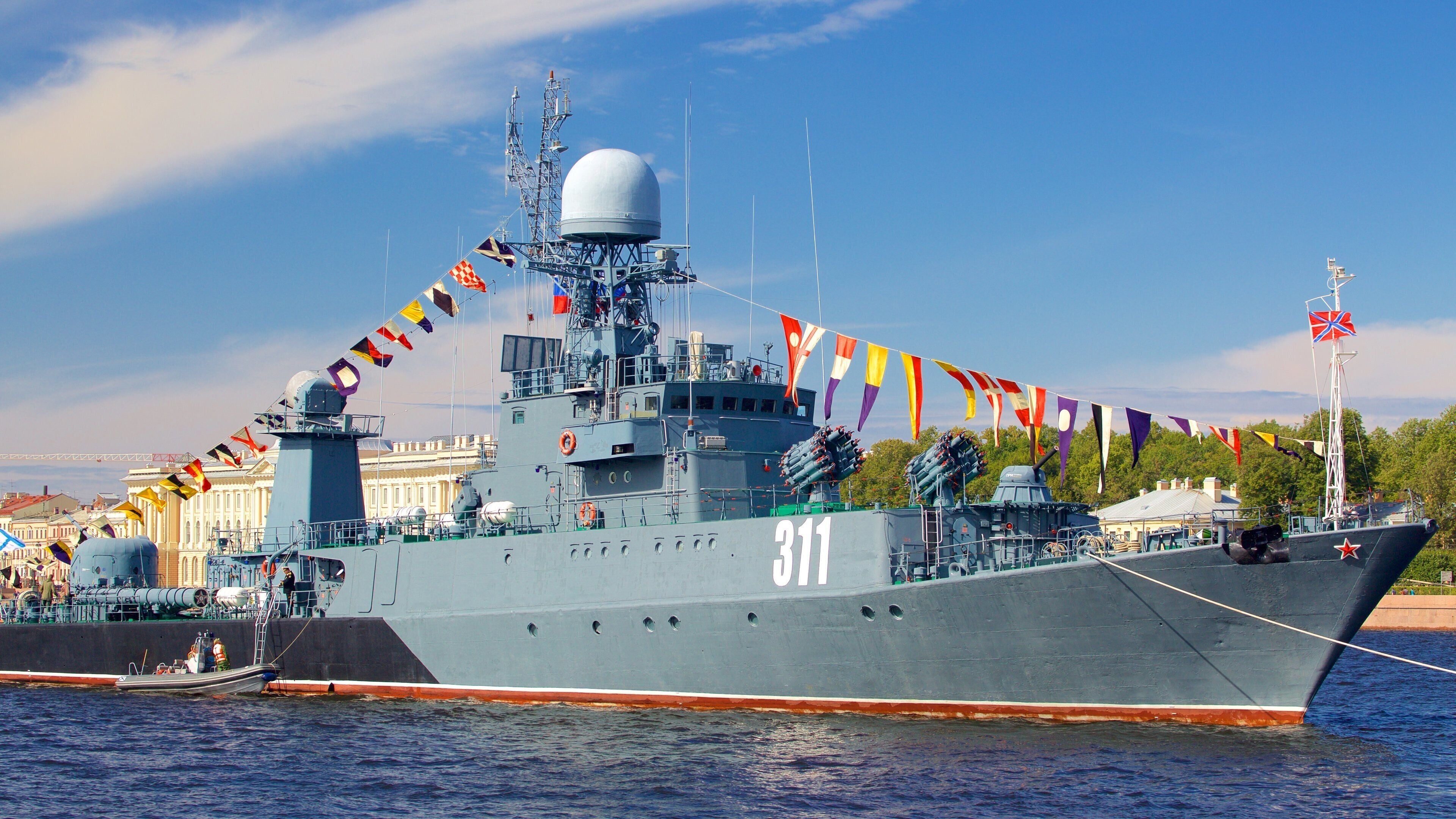 Admiralty Embankment featuring a river or creek, a marina and military items