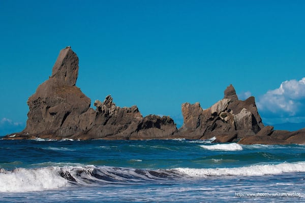 Here it is again, what I called the "Old Woman Seated" sea stack, but this time you can see the full formation, and a nicely sculpted wave in the foreground.