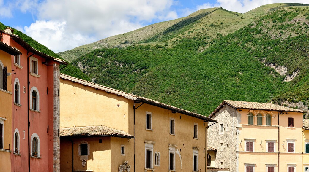 Houses and green hills in Italy