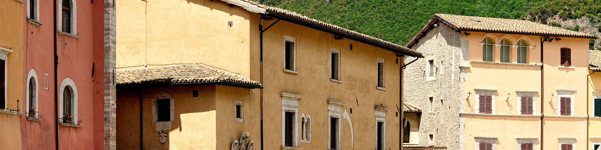 Houses and green hills in Italy