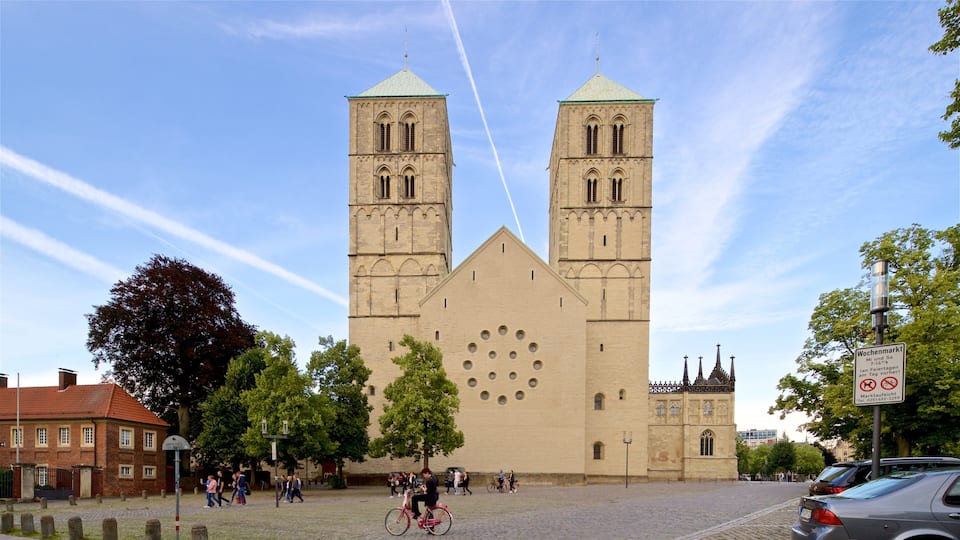 A historic church with two towers and a large rose window.