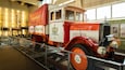 A vintage red and white truck with the text "Dortmunder Union Brauerei AG" and "Kruppe" on it.