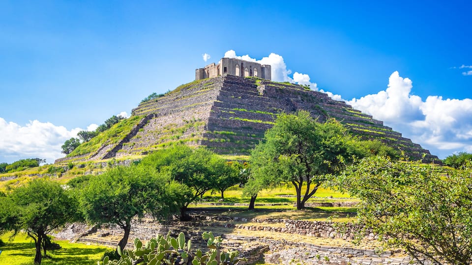 El Pueblito Pyramid in Queretaro seen from above and surrounded by the city